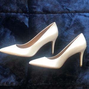 Patent leather pumps by Calvin Klein